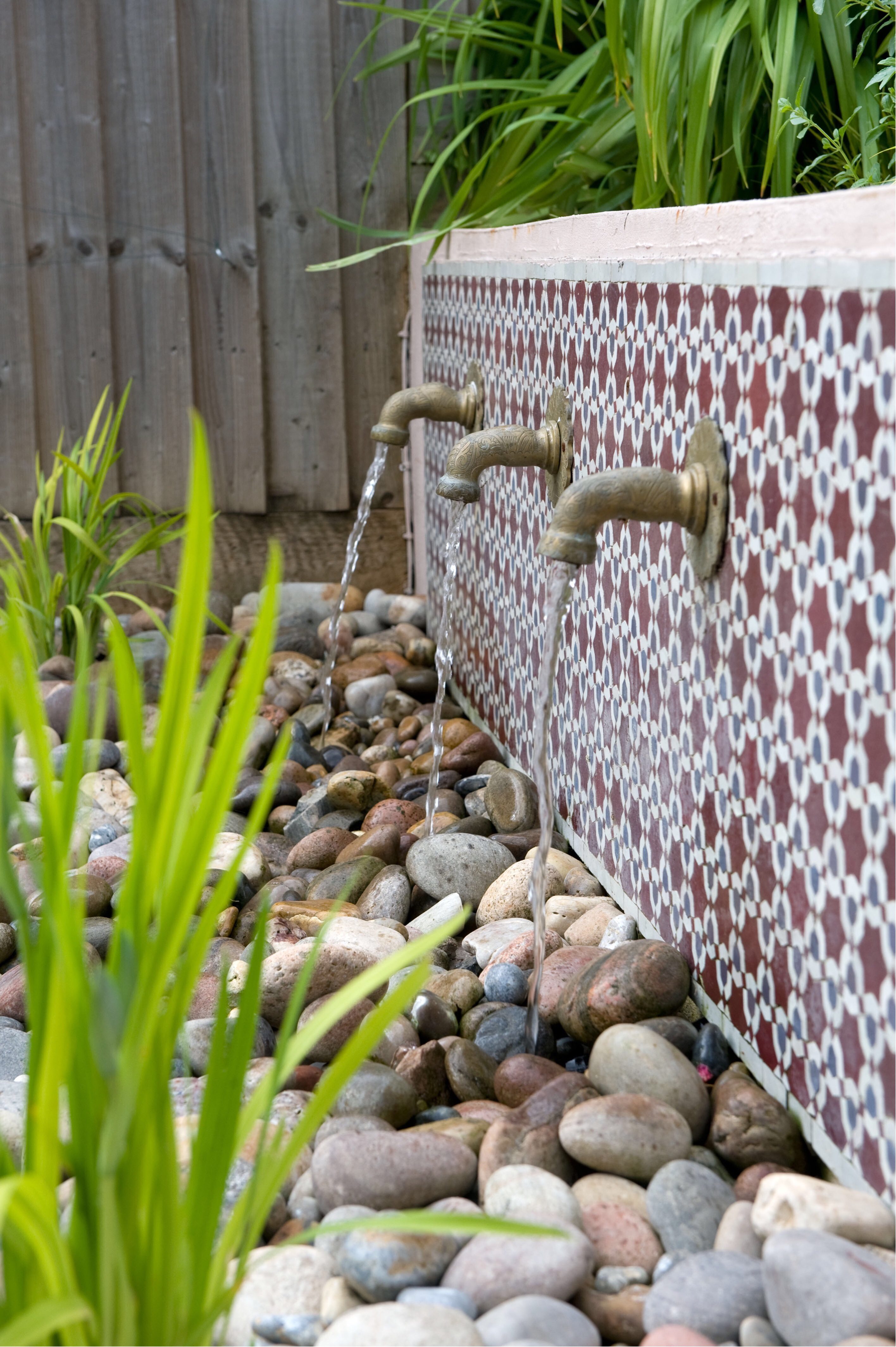 Garden water feature design tips - wall mounted ones are popular